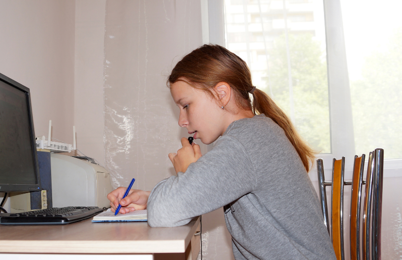 Girl doing homework at desk